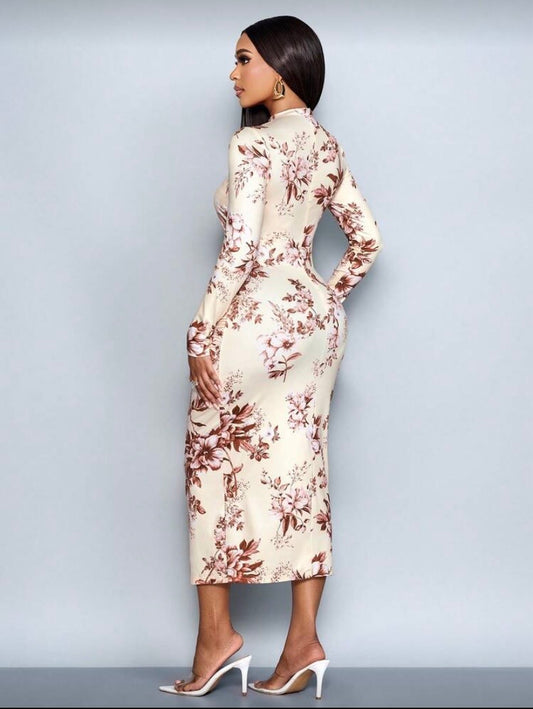 Robe élégante à imprimé floral, manches longues et découpes raffinées ✨