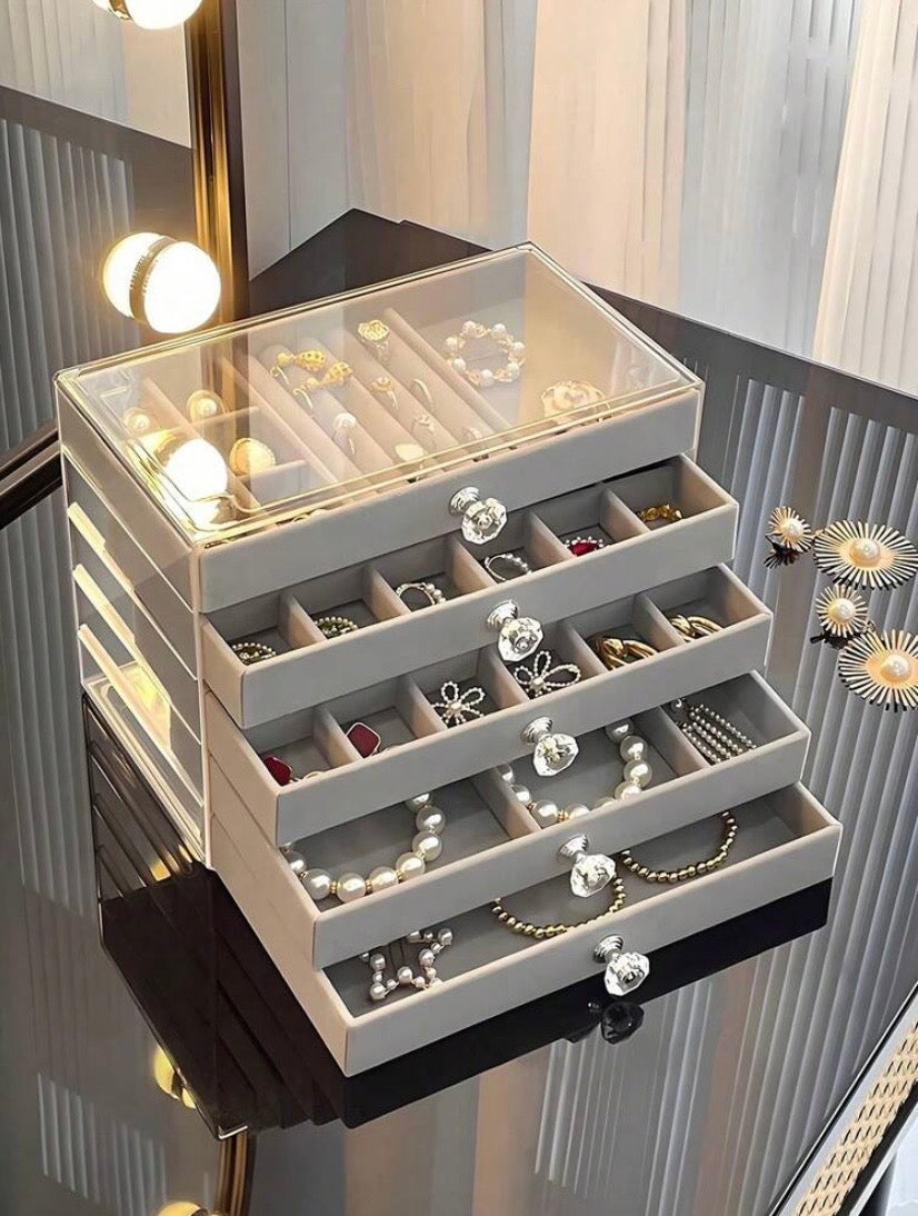 Boîte de rangement à bijoux en acrylique transparent à plusieurs niveaux avec tiroirs empilables, idéale pour organiser colliers, bracelets et boucles d’oreilles.