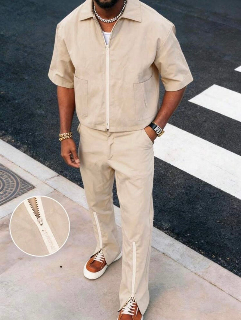 Ensemble 2 pièces pour homme avec haut zippé à manches courtes et pantalon léger, idéal pour un style décontracté au quotidien en été.