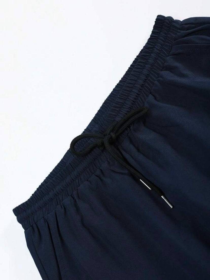 Ensemble décontracté pour homme coupe ample en couleur unie avec chemise à col à revers et pantalon confortable.