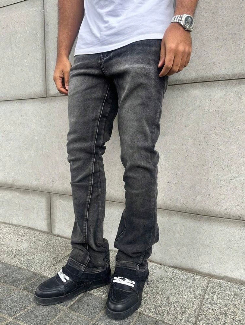 Jean slim pour homme en denim stretch effet usé, style streetwear décontracté adapté à toutes les saisons.