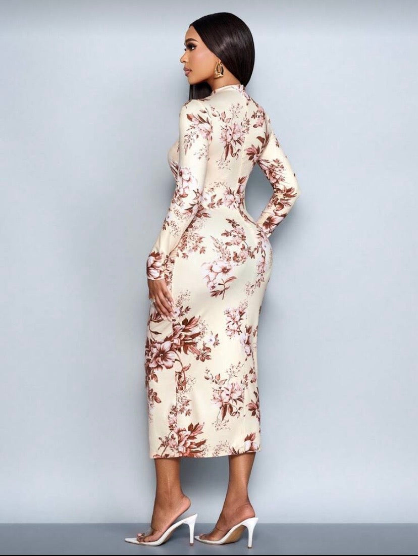 Robe élégante à imprimé floral, manches longues et découpes raffinées ✨