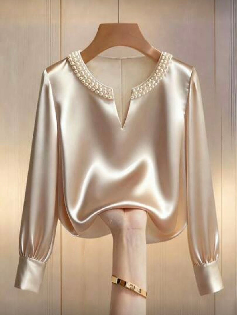 Blouse satinée à manches longues avec perles décoratives, coupe fluide et élégante 👚
