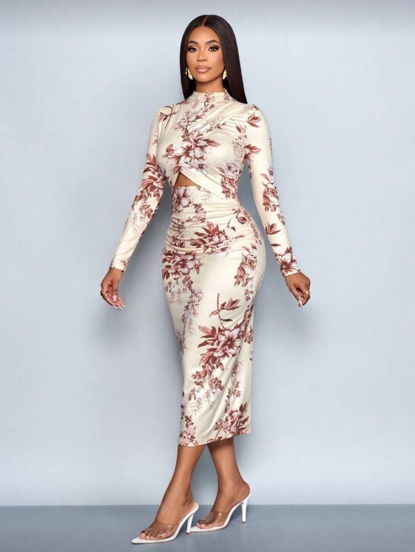Robe élégante à imprimé floral, manches longues et découpes raffinées ✨