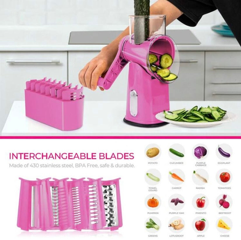 Râpe rotative manuelle avec poignée et lames interchangeables, base ventouse et rangement intégré, idéale pour fromage, légumes et fruits secs.