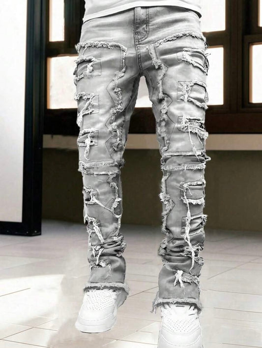 Jean streetwear pour homme avec détails à franges superposées, style créatif et inspiration emo pour un look urbain audacieux.